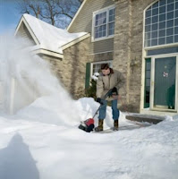 Toro 38361 Power Shovel Electric Snow Thrower, in action, image