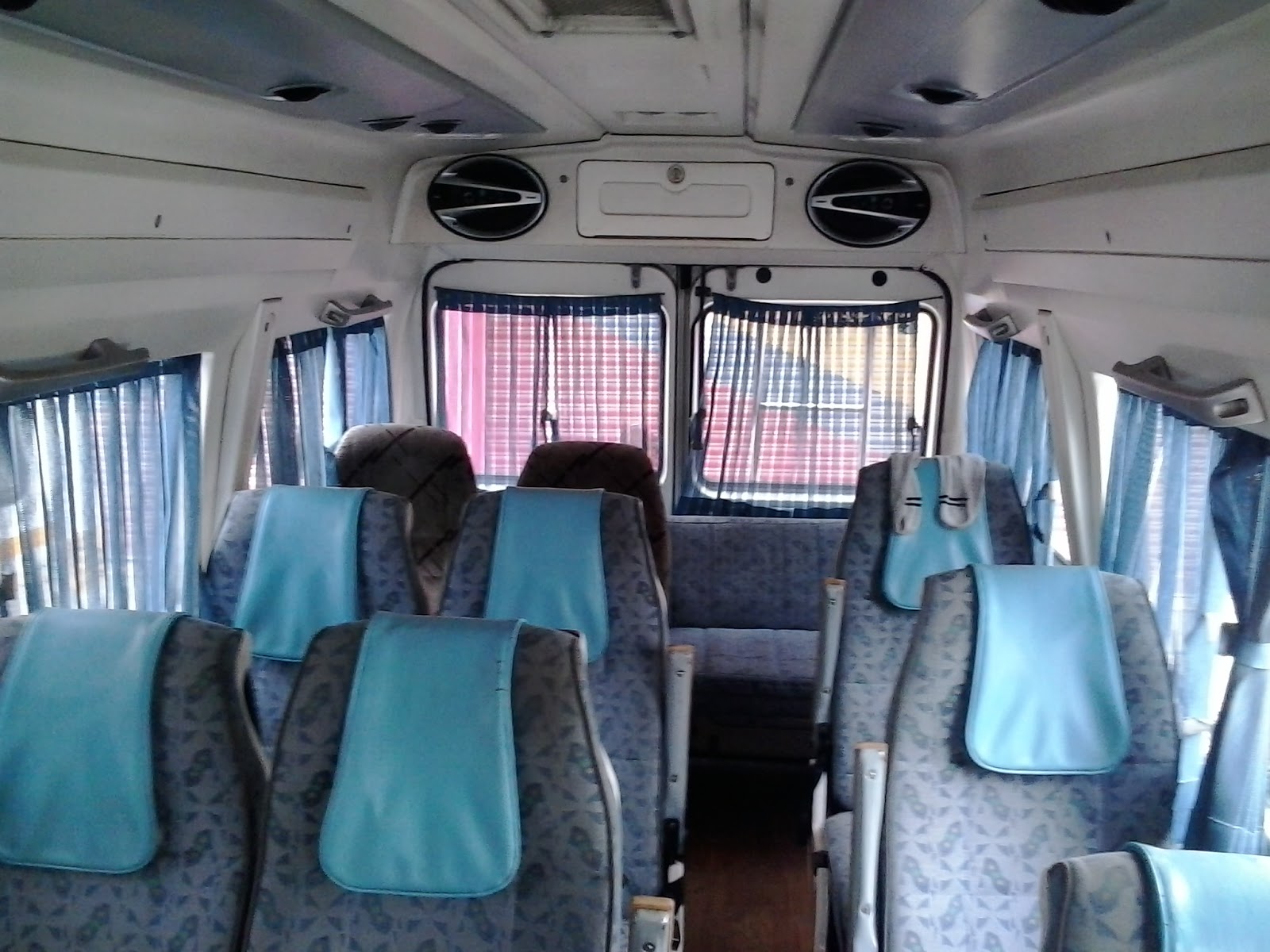 15 seater tempo traveller near me