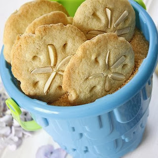 sand dollar cookies in beach pale