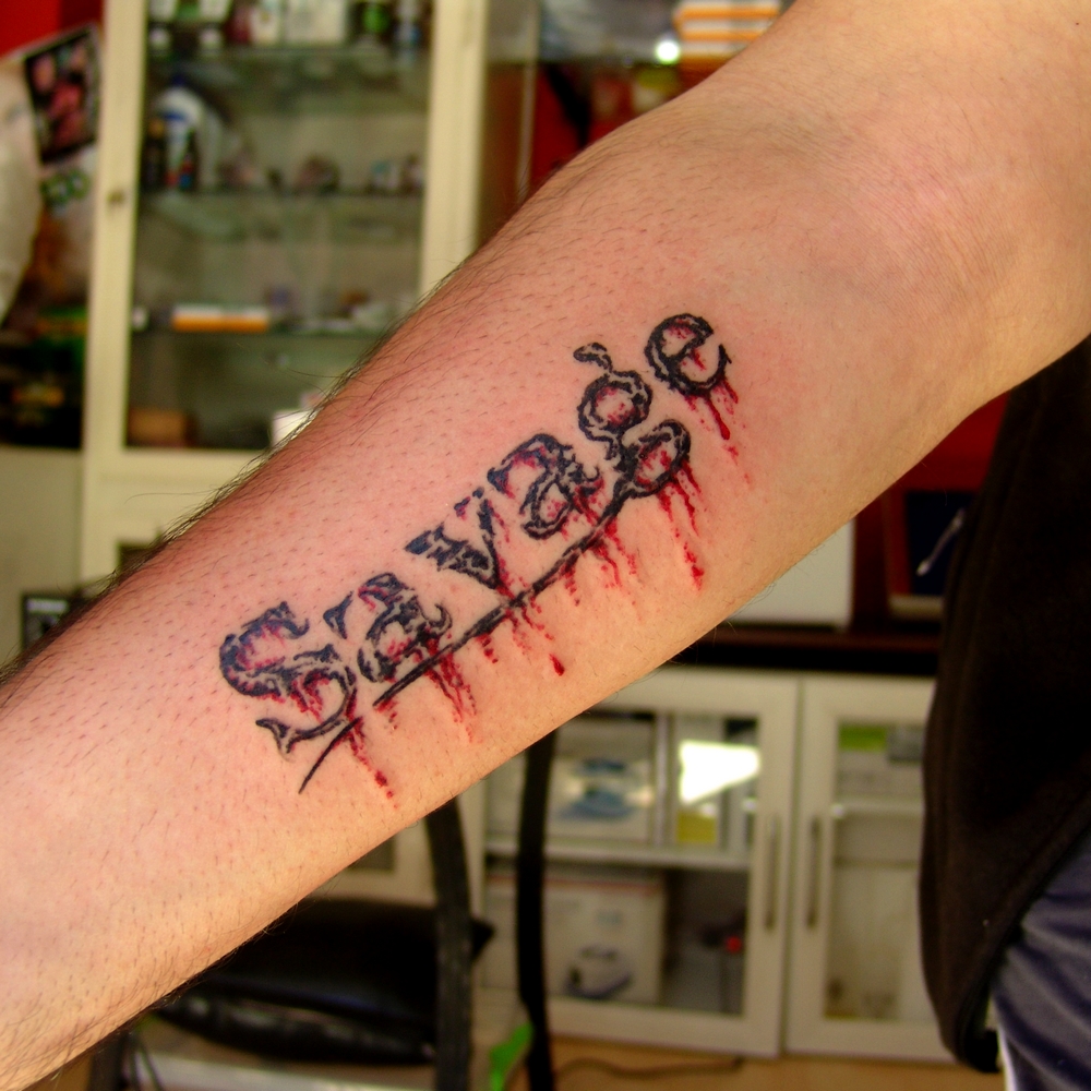 Savage Tattoo.