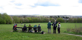 Some of the group on a seat at the top of the meadow.  Darrick Wood, 21 April 2012.