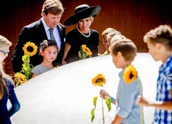 King Willem-Alexander and Queen Maxima attend the MH17 remembrance ceremony and the unveiling of the National MH17 monument in Vijfhuizen