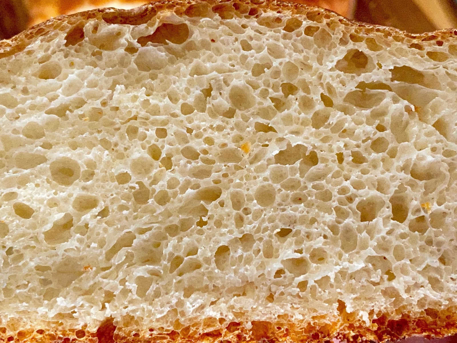 Пицца на кефире на сухих дрожжах. Крупнопористый хлеб. Пористый хлеб. Не пористый хлеб. Пористость хлеба фон.