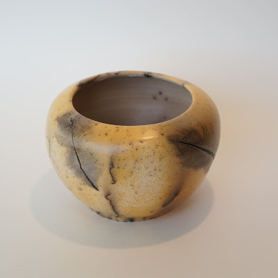 Beautiful handmade horsehair and feather raku pottery vase by Lily.