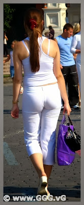 Girl in tight pants on the street 