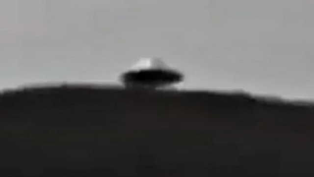 Amazing UFO filmed through a telescope in Mexico.