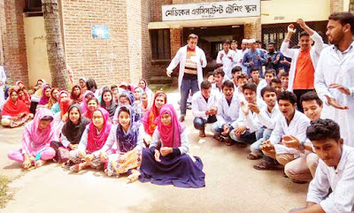 Students boycotted classes and protested to cancel the transfer order of Tangail Mats teacher Abdul Mannan