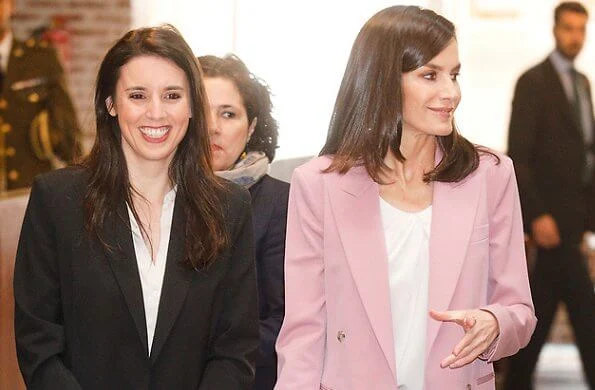 Queen Letizia wore Hugo Boss Jericoa stretch wool double-breasted blazer and trousers. Hugo Boss silk blouse, gold earrings