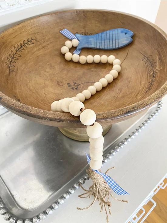 fish garland in a wooden bowl