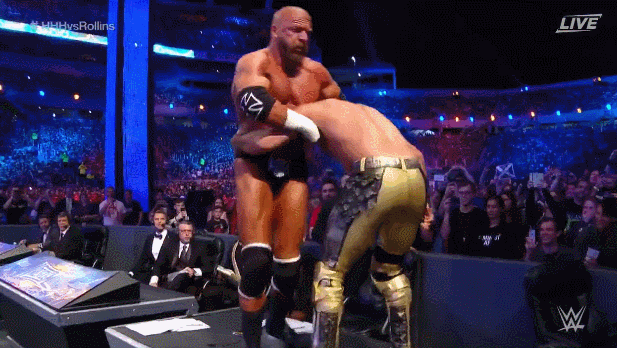 Outside+DDT+on+the+Announcers+Table.gif