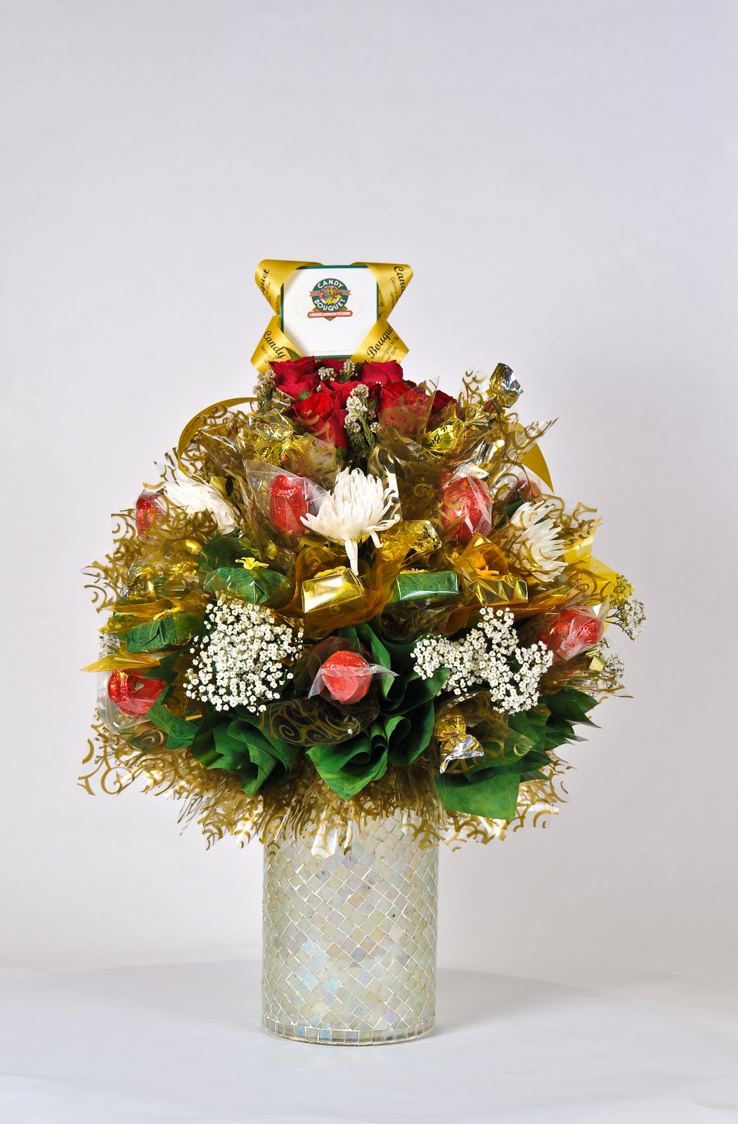 Candy Bouquet Soon In Doha Combination between chocolate & Flowers