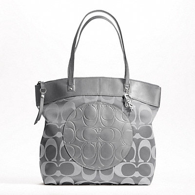 This Coach 'Laura North South' tote bag features the signature 'C ...