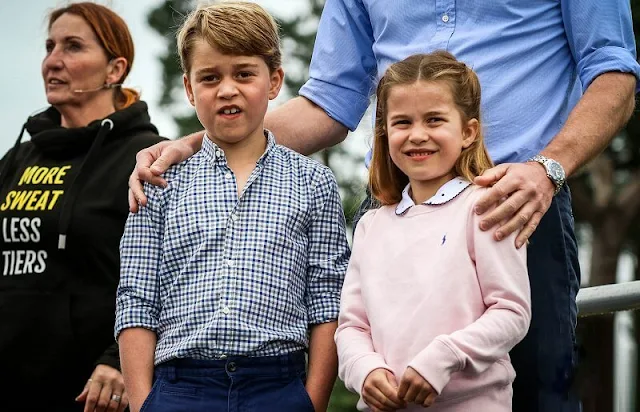 Princess Charlotte wore a pair of denim shorts, and bright pink Nike trainers, and a baby pink sweatshirt by Ralph Lauren