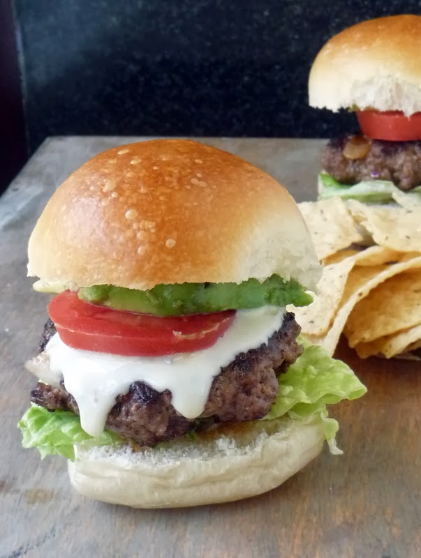 Taco Sliders - These little burgers made with taco seasoning are a nice change of pace. It takes 2 of my favorites, tacos and burgers, and mashes them together into one tasty little treat! Adding Queso Blanco takes them over-the-top!! So yummy!