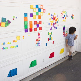 Using Magnetic toys to make giant murals on your garage wall- Easy and Fun Family Process Art Idea