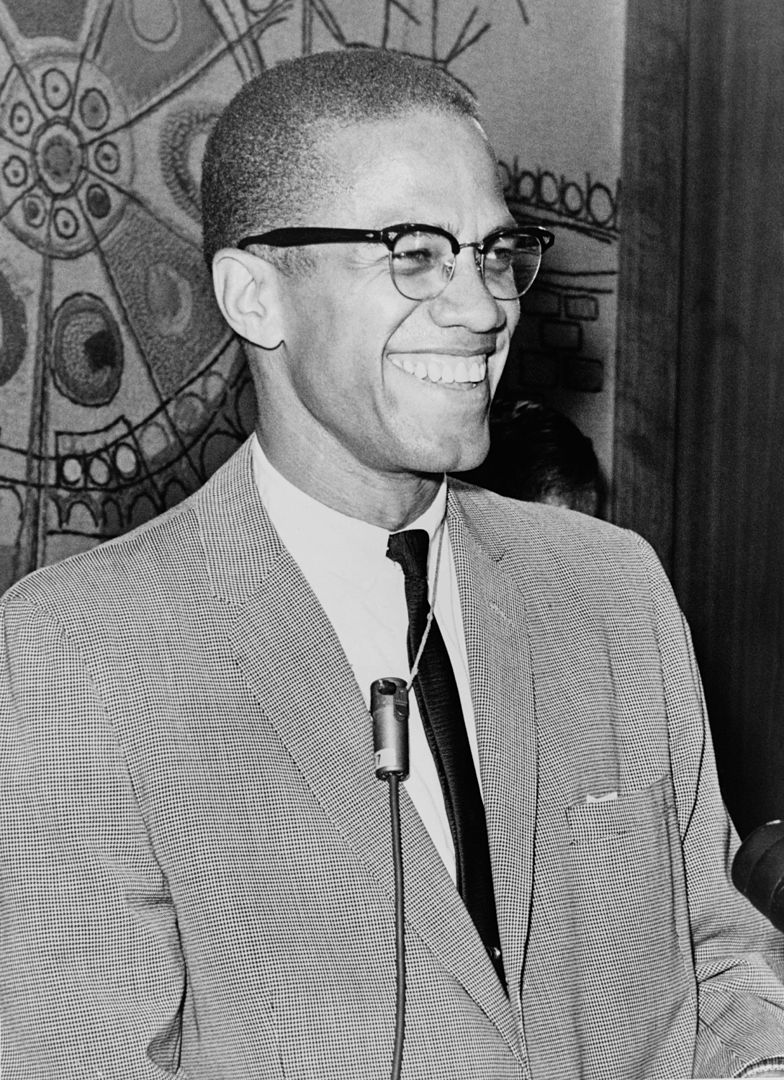 Malcolm Little or Malcolm X, El-Hajj Malik El-Shabazz in March 1964 happy as ever