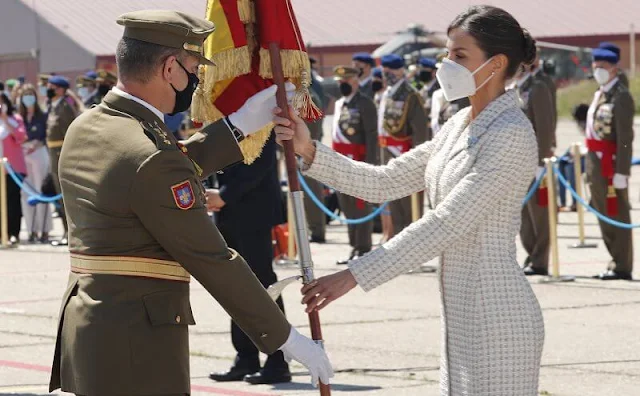 Queen Letizia wore a dress by Felipe Varela for baptism ceremony of Princess Leonor. Carolina Herrera authentic handbag