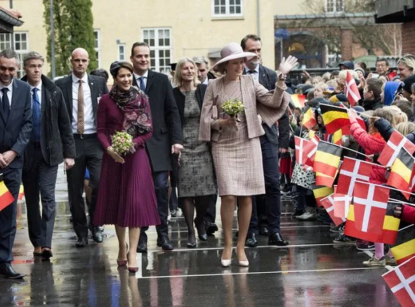 Crown Princess Mary wore Gianvito Rossi pumps, Alexander-McQueen skirt and coat, Prada Brushed Leather Pumps in Dark Red