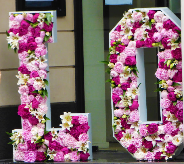 Floral letters in Sloane Square, London, for Chelsea in Bloom 2018 free flower festival
