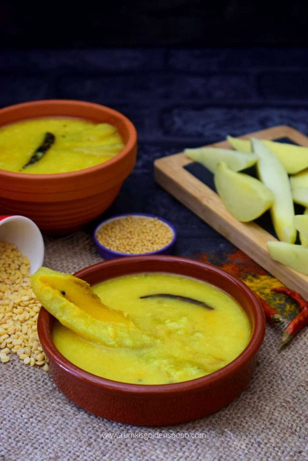 aam dal, aam dal recipe, aam dal Bengali recipe, kacha aam dal recipe, how to make aam dal,aam diye moong dal, tok dal, tok dal recipe, tok dal Bengali recipe, how to make tok dal, aamer tok dal, kacha aam diye tok dal, tok dal kacha aam diye, Bengali tok dal, Bengali aam dal, mango dal, mango dal recipe, how to make mango dal, mango dal Bengali recipe, dal with mango recipe, green mango dal recipe, raw mango dal, raw mango dal recipe, dal with raw mango recipe, dal with raw mango, dal recipe, dal recipes, recipe for dal, bengali recipe, bengali recipes, bengali food, vegetarian recipes of india, vegetarian recipes in India, bengali food recipes, recipes of bengali food, homemade bengali food, traditional bengali food, bengali recipes veg, bengali traditional food, traditional food of Bengali, bengali veg recipe, bengali veg recipes, bengali vegetable recipe, bengali vegetarian recipe, lentil soup, mango lenitil soup, recipe for moong dal, Bengali style aam dal, Rumki's Golden Spoon