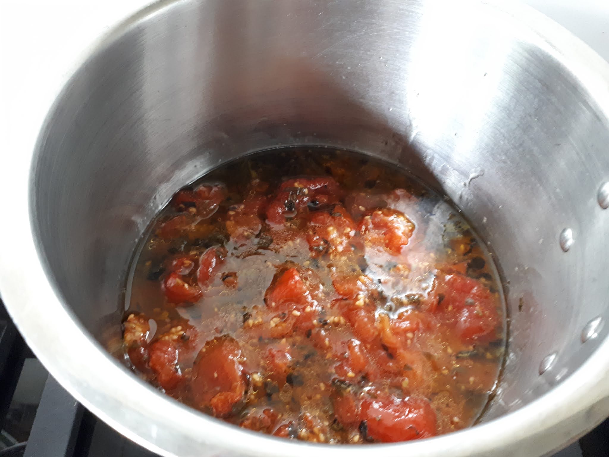 SICILIAN VEAL INVOLTINI WITH HERBED RISONI, ROAST TOMATO AND OREGANO SAUCE