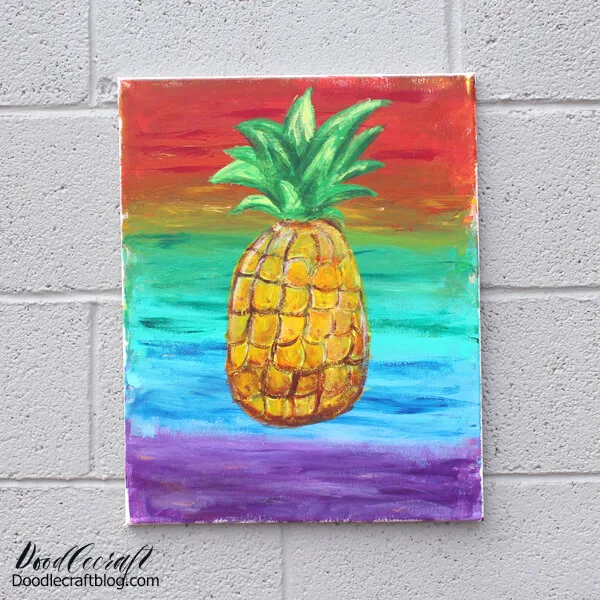 This darling pineapple painted with acrylic craft paints on canvas was done by my daughter a few years ago. It looks great as-is...but like she came home from art class with it. She obviously would get an A, but I wanted to kick it up a little more.