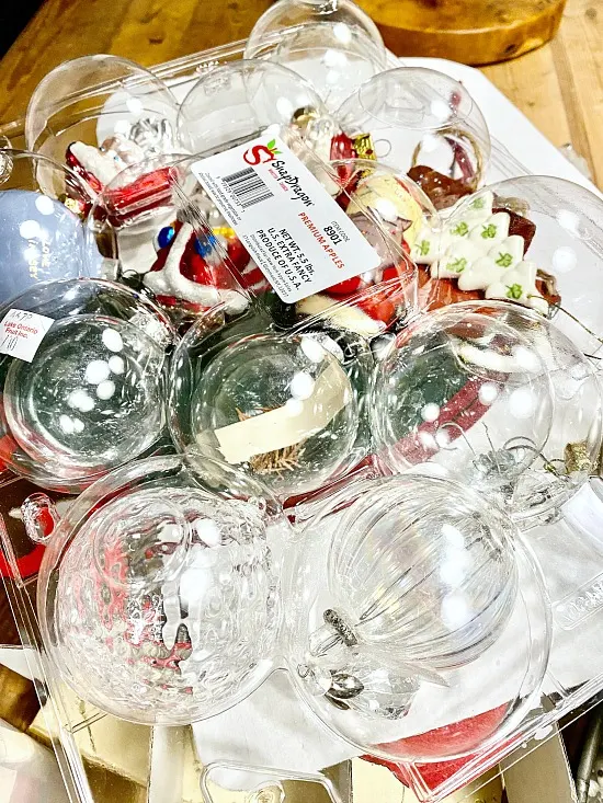 Apple storage container filled with ornaments