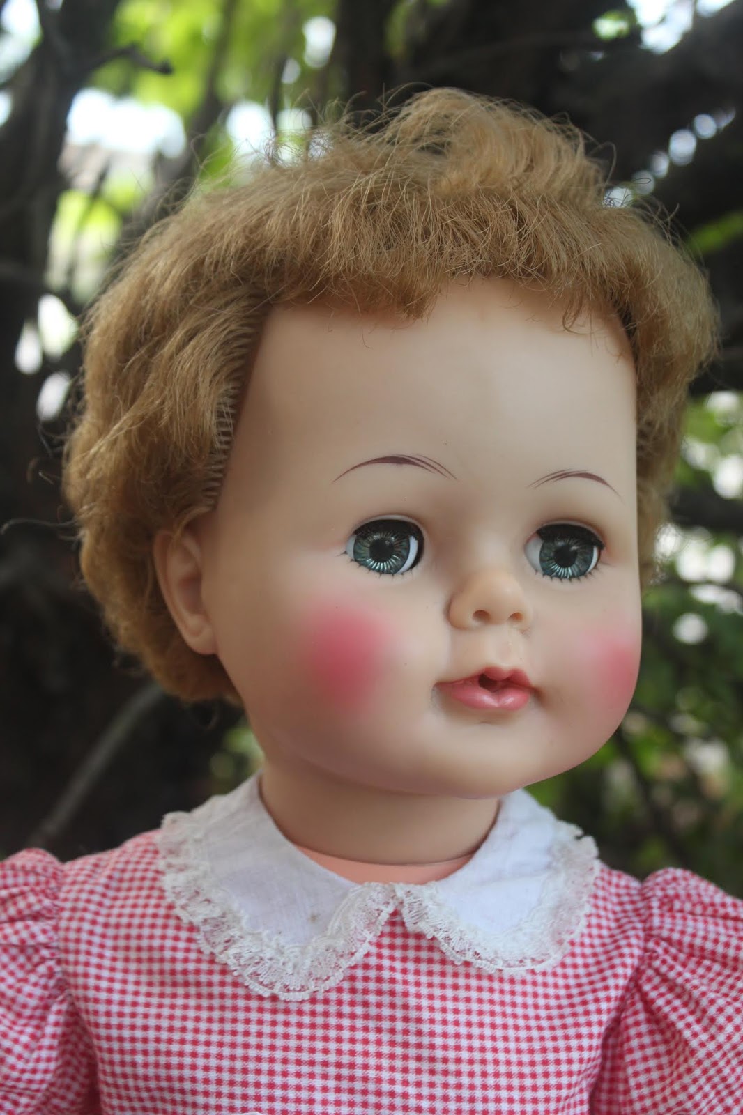 doll with red cheeks