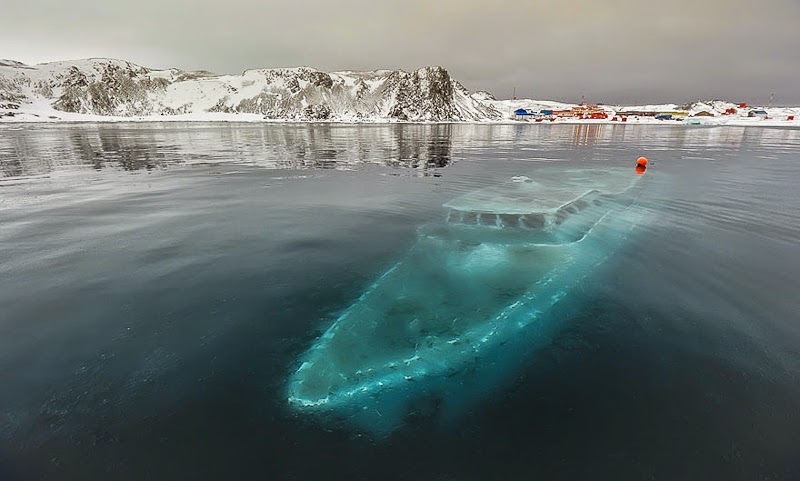 12. Sunken Yacht, Antarctica - 31 Haunting Images Of Abandoned Places That Will Give You Goose Bumps
