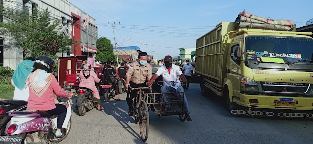 al haris kayuh becak di tungkal