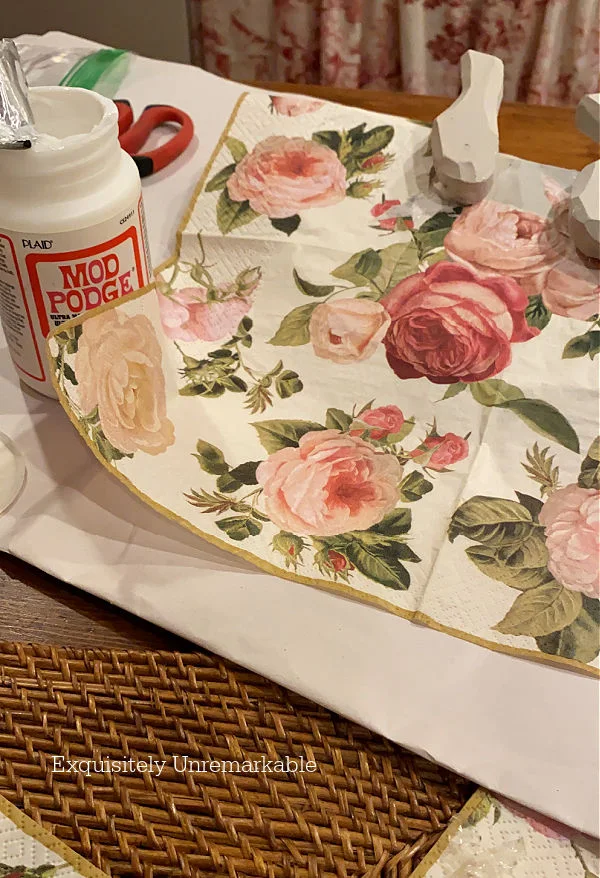 Floral Napkin draped over wooden pig