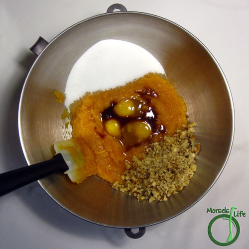 Morsels of Life - Pumpkin Spice Muffins Step 2 - Form Wet Team by mixing eggs, pumpkin, oil, sugar, and walnuts.