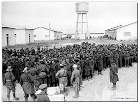 British POW in North Africa covered by Italian soldiers. December 1941. The prisoners were captured during the advance of Italian troops in Cyrenaica during the battle at Bir el Gubi