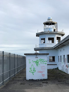 Graffiti on abandoned, derelict lighthouse at Leith Docks, Edinburgh.  Photo by Kevin Nosferatu for the Skulferatu Project