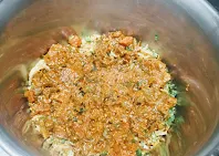 Layering vegetables over rice for veg biryani recipe