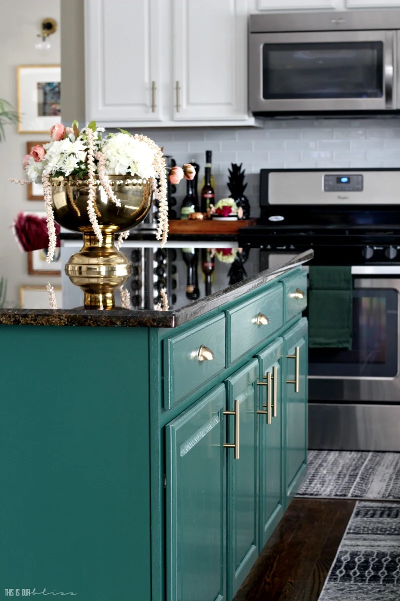 Emerald green color on kitchen island cabinets