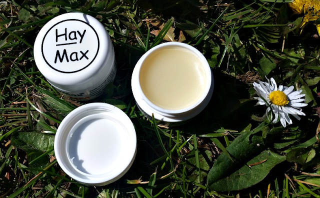 The opened tub of HayMax balm.