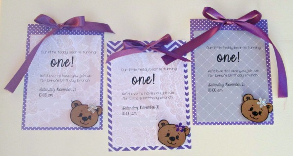 Purple teddy bear invitations for a girl's first birthday party