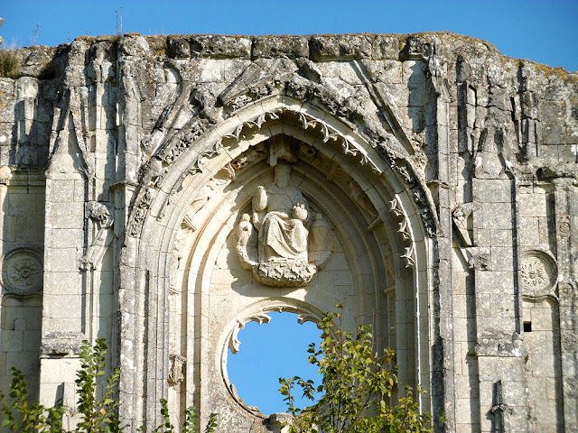 A high-relief sculpture depicting God the Father, Les Roches Tranchelion, Indre et Loire, France. Photo by Loire Valley Time Travel. A high-relief sculpture depicting God the Father, Les Roches Tranchelion, Indre et Loire, France. Photo by Loire Valley Time Travel.