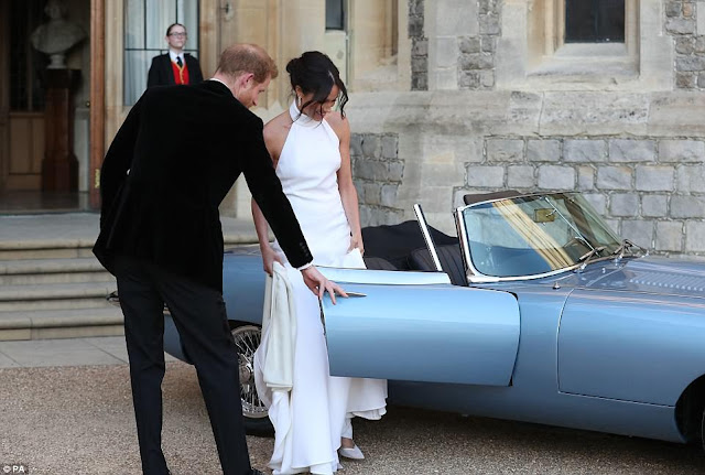 Meghan Markle is stunning in her second dress as she and her new husband head to their wedding reception (photos)