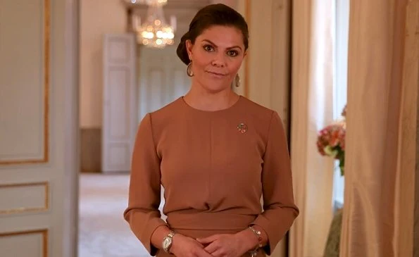 Crown Princess Victoria wore a her Andiata Kiana blouse and Charlotte Bonde Sophie petite earrings