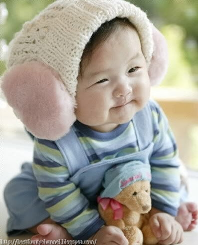 Cute baby and toy.