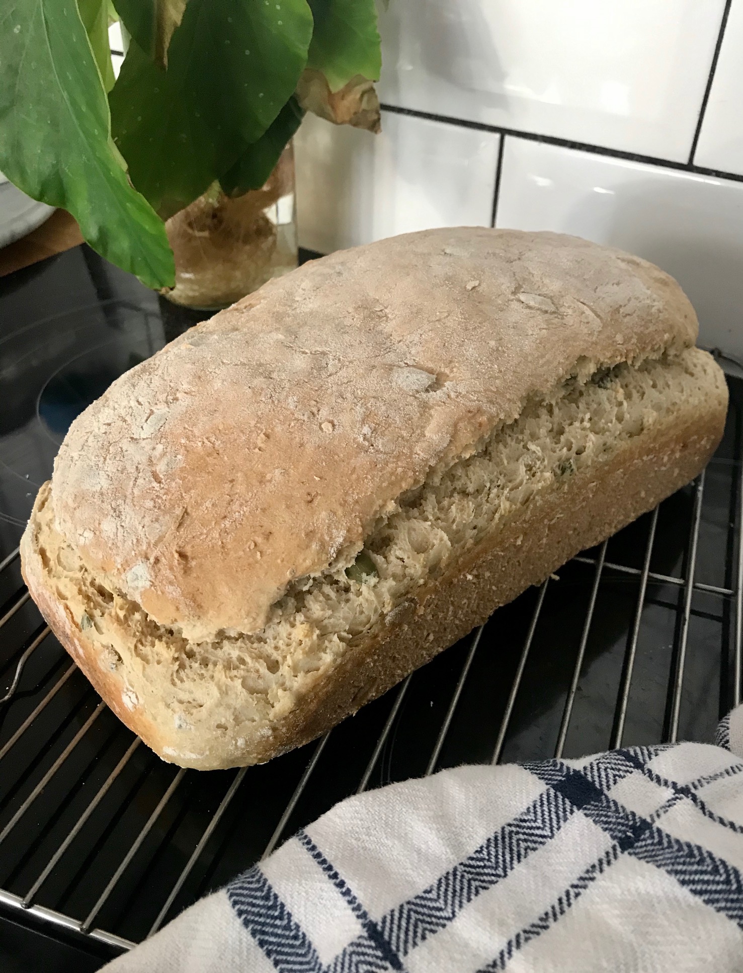 Grainy sourdough sandwich bread loaf