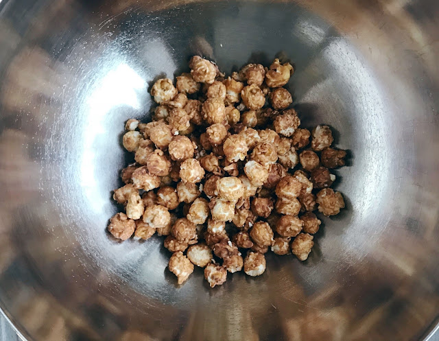 Salt Caramel popcorn in a metal bowl