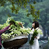 Young girls by lilies