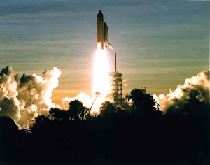 SPACE SHUTTLE DISCOVERY LIFTS OFF