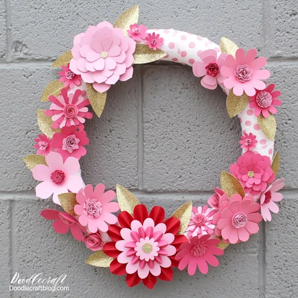 Wooden heart, decorated with fabric flowers and a linen Ribbon