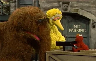 Elmo sings Elmo's Song to Big Bird and Snuffy. Sesame Street The Best of Elmo