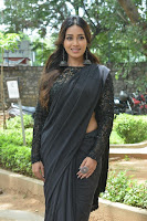 Actress Nivetha Pethuraj in Black Saree Stills at Paagal Movie Trailer Launch. HeyAndhra.com