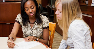 Women updating a resume